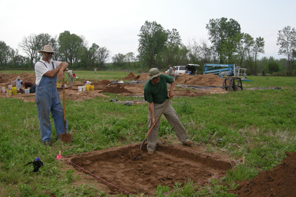 John Riggs and Jerry Hilliard opening excavation unit